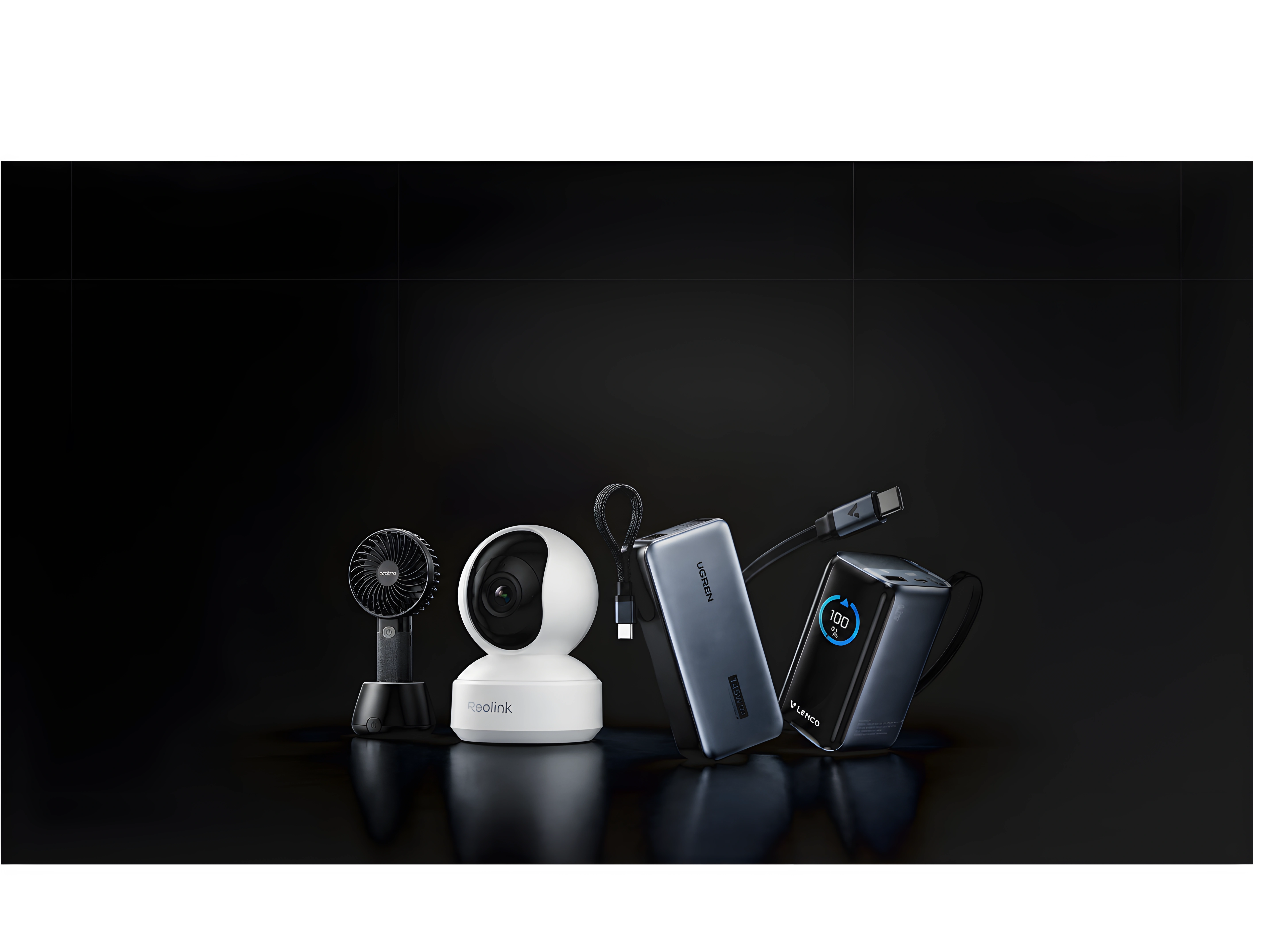 Hands showcasing smart electronics, multi-port chargers and a magnetic power bank